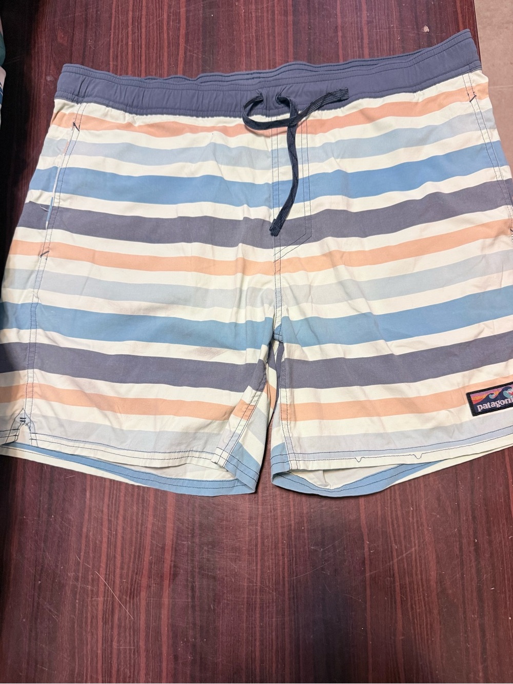 Patagonia Men’s Navy, Blue, Peach and Cream Striped Swim Trunks